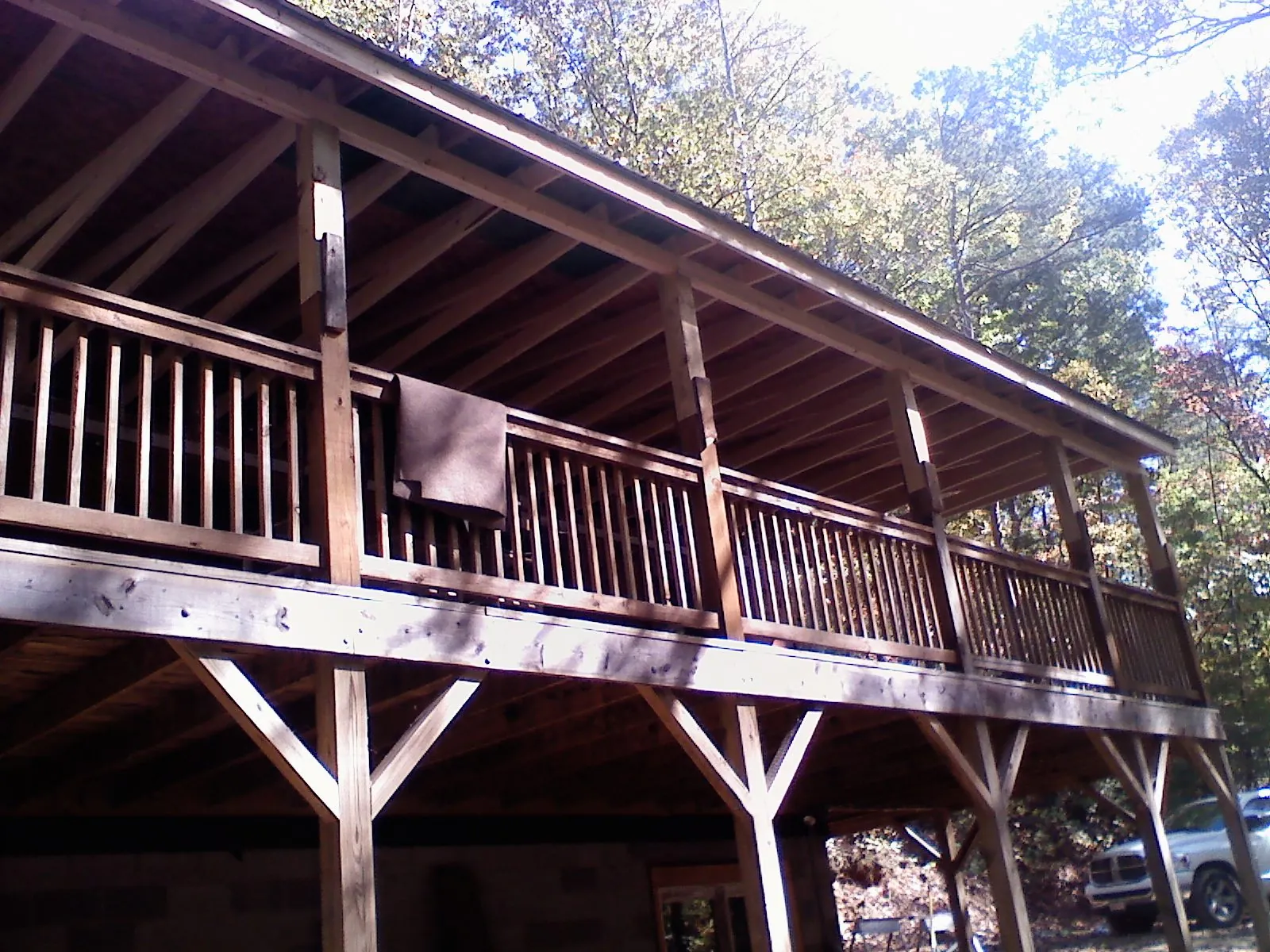 Timber framing under a new elevated porch and deck — Roof Leak Repair in Bay Center by Roofing Brothers
